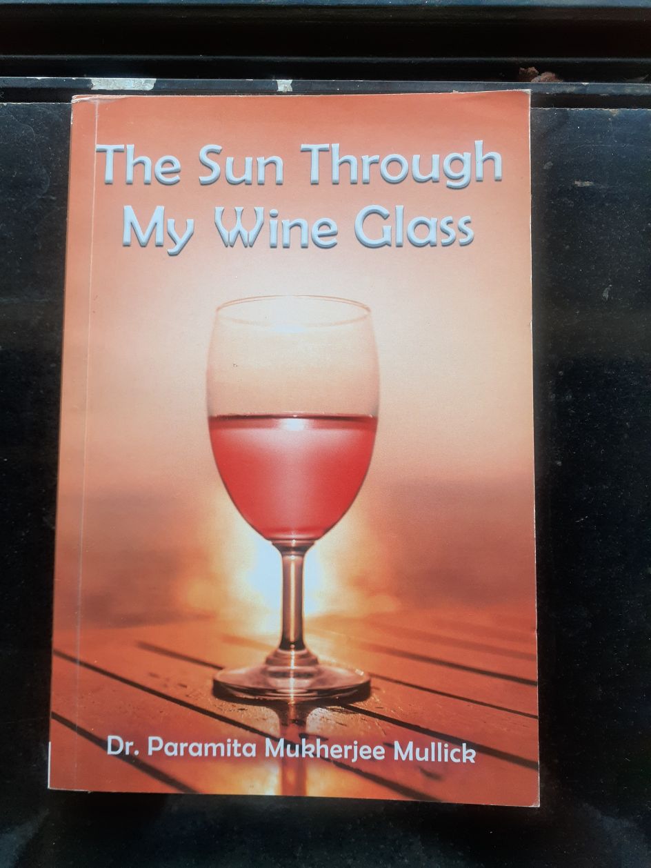 THE SUN THROUGH MY WINE GLASS